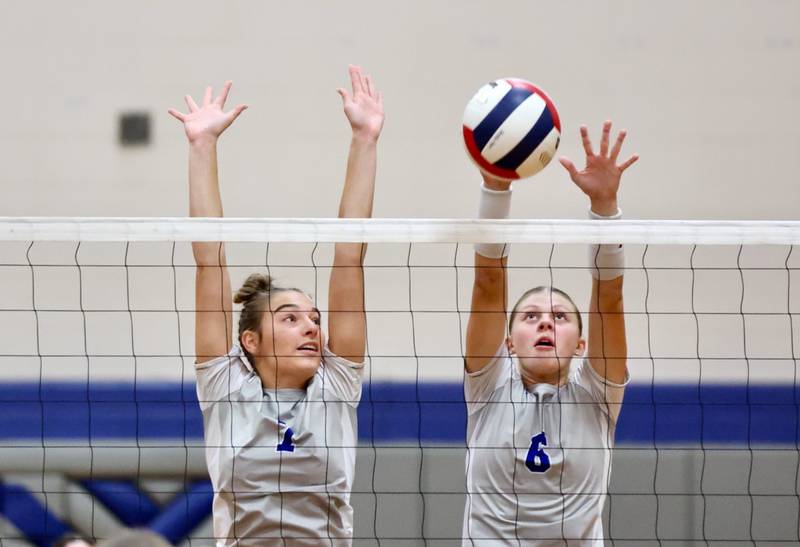 Princeton's Kathy Maciczek (7) and Caroline Keutzer (6) team up for a block in Tuesday's match against Kewanee at Prouty Gym. The Tigresses won 25-8, 25-22.