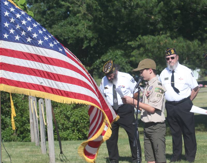Payton Lawless of Peru Boyscout Troop 123 delivers a speech during a Flag Retirement Ceremony on Friday, June 14, 2024 at Veterans Park in Peru.  The ceremony began as a Eagle Scout project for area boy scouts about 30 years ago. Boy Scouts from Peru's Troop 123 and Peru Cub Scouts from Pack 3709 were on hand to help with the ceremony. When an American Flag gets torn and tattered, Flag etiquette requires it to be proper disposed in a burning cauldron.