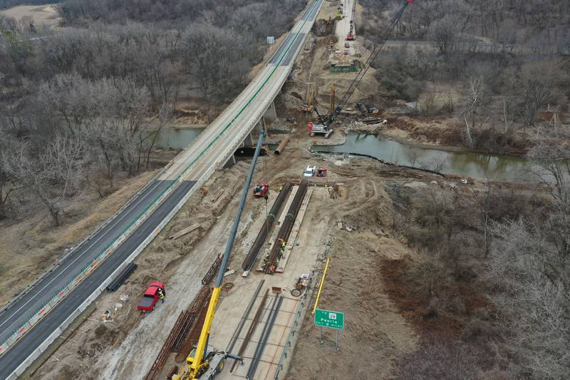Crews with the Illinois Department of Transportation work on replacing a bridge structure on Interstate 180 over the Tiskilwa Bottom Road on Tuesday, March 18, 2025. According to IDOT, the $24.2 million dollar project includes replacing beams and decking on the current bridge.  During the replacement, only one-lane of traffic in each direction is using the northbound lanes as work happens on the southbound bridges. When that work is complete, traffic will be switched to the southbound lanes to begin work on the northbound bridges.