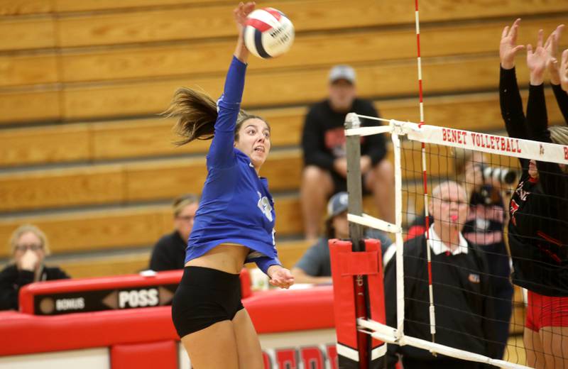 St. Charles North’s Haley Burgdorf goes up for a kill during a game on Monday, Oct. 7, 2024 at Benet in Lisle.
