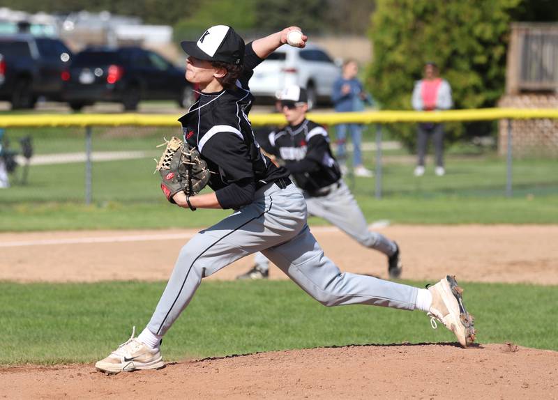 Kaneland's Hayden Foster delivers a pitch Tuesday, April 28, 2026, during their game against Sycamore at the Sycamore Community Sports Complex.