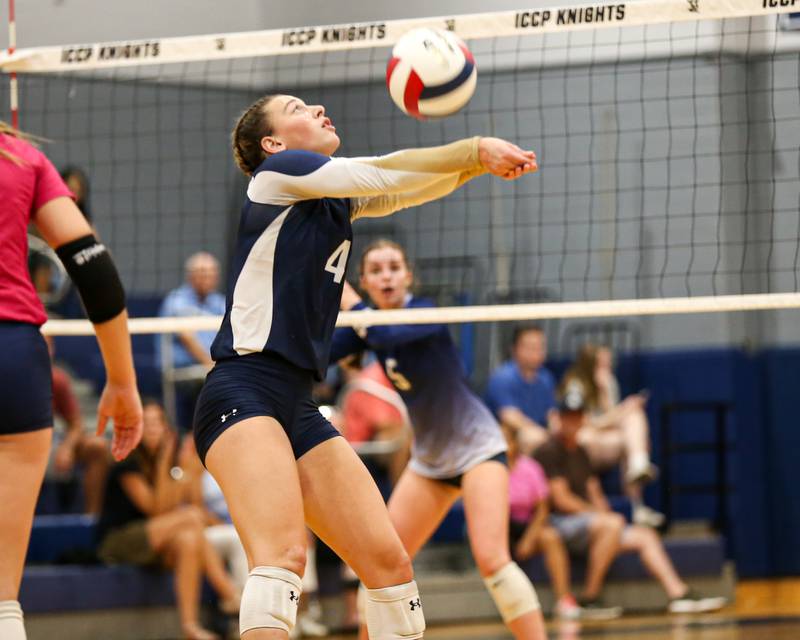 IC Catholic Prep's Ava Falduto(4) with a dig save during volleyball match between Nazareth at IC Catholic Prep.  Aug 29, 2023.