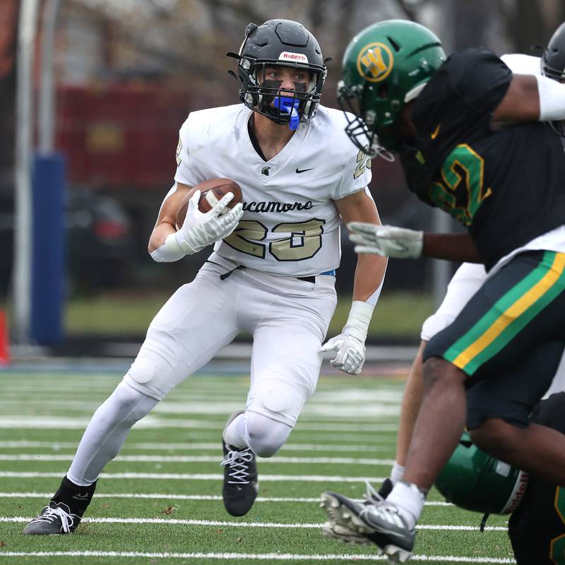 Sycamore's Dylan Hodges looks to get by Westinghouse's Daesean Gafford Saturday, Nov. 9, 2024 during their Class 5A second-round playoff game at Knute Rockne Stadium in Chicago.