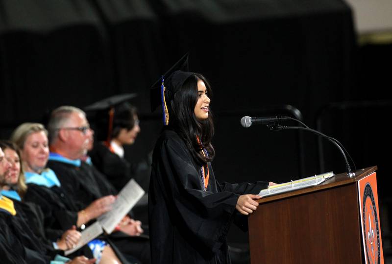 St. Charles East graduate Deetya Solanki, president of the student council executive board, addresses her classmates, family members and staff during the school’s 2025 commencement ceremony on Thursday, May 22, 2025 at Northern Illinois University in DeKalb.