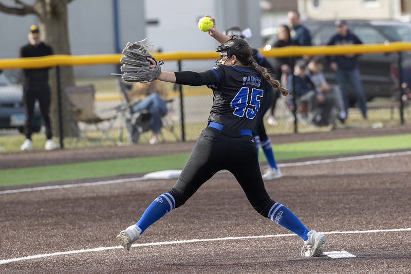 Newman’s Gianna Vance fires a pitch against Sterling Tuesday, March 18, 2025.