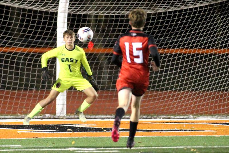 Glenbard East goalkeeper Cooper Wooldridge makes a save during a 3A St. Charles East Sectional semifinal against Conant on Wednesday, Oct. 26, 2022.