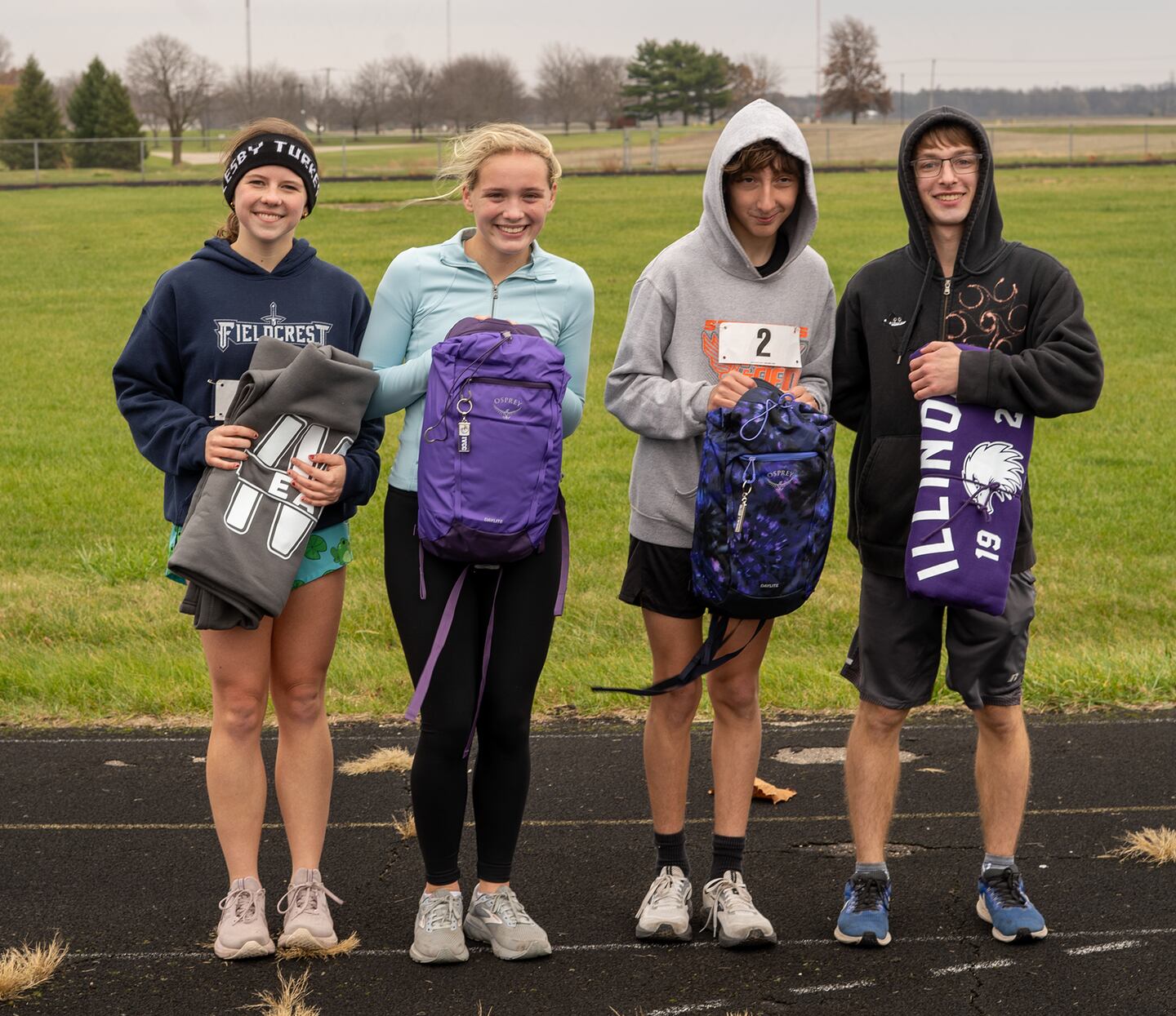 Eagles Run 5K winners were, from left, Hannah Schumacher, Addyson Miller, Connor Medina and Anthony Kelson.