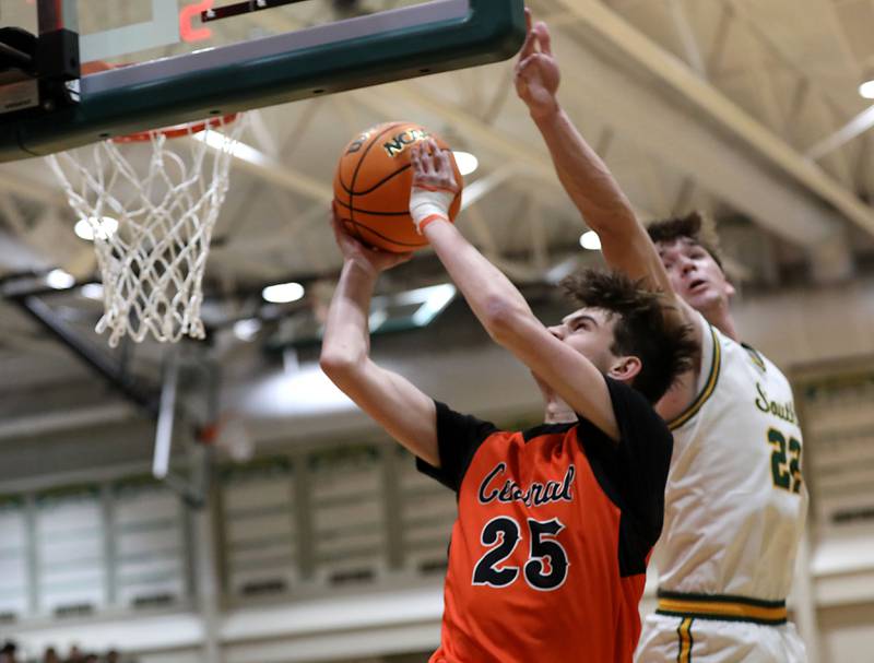 Crystal Lake Central's Aidan Watson drives to the basket agains tCrystal Lake South's Nick Stowasser during an IHSA Class 3A Crystal Lake South Regional boys basketball semifinal game on Wednesday, February, 25, 2026, at Crystal Lake South High School.