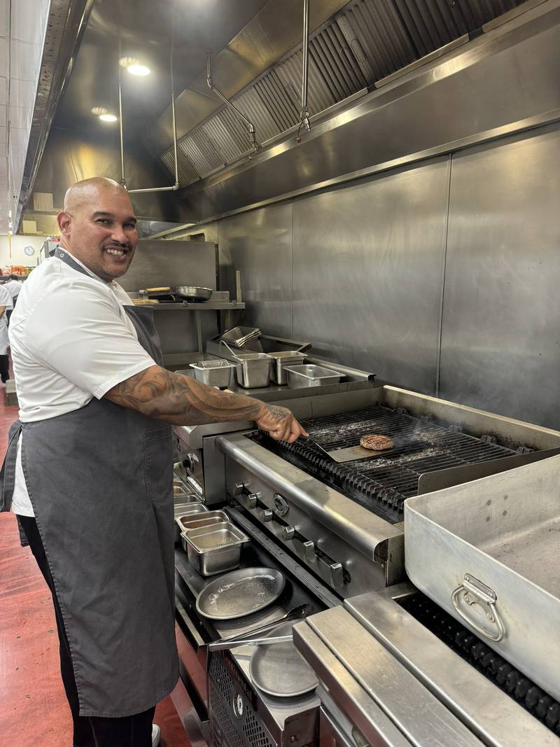 New head chef AJ McCloud works in the kitchen of Mickey Finn's in Libertyville.