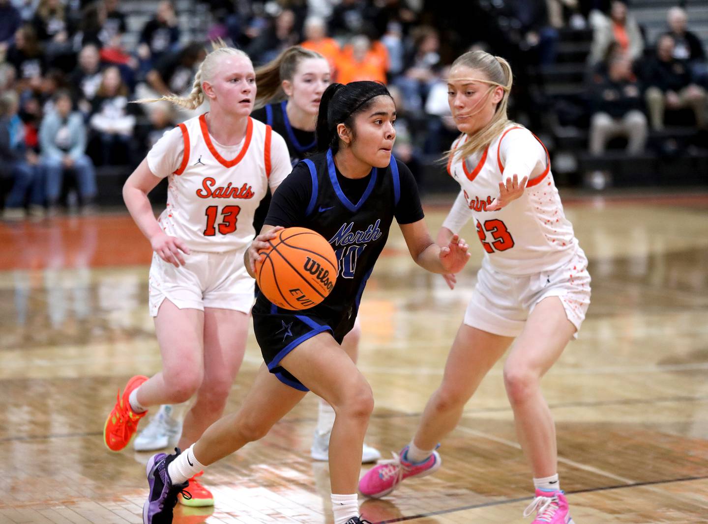 St. Charles North's Lelanie Posada drives toward the basket during a game on Friday, Jan. 31, 2025 at St. Charles East.