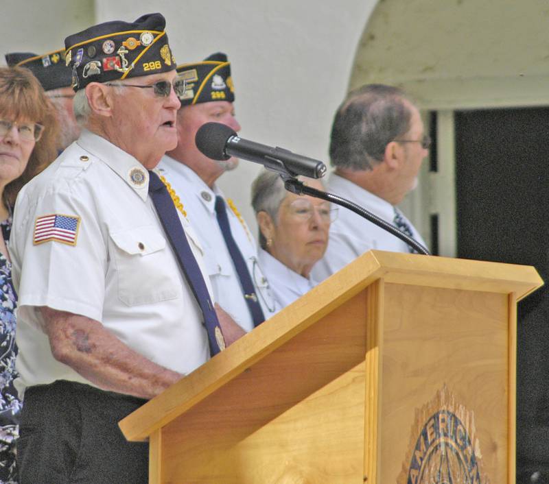 Mike Wolber of Sterling American Legion Post 296 leads the ceremony Monday, May 26, 2025, at Grandon Civic Center in Sterling.