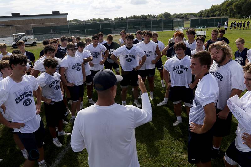 Cary-Groves head coach Brad Seaburg talks to his team during Cary-Grove’s first football practice of the upcoming season on Monday, August 11, 2025, at Cary-Grove High School.
