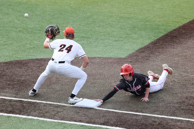 Bradley-Bourbonnais’ Keaton Allison dives safely back to first base during the Boilermakers’ 2-0 loss to Normal Community in the IHSA Class 4A Illinois Wesleyan University Sectional semifinal on Thursday, June 5, 2025.