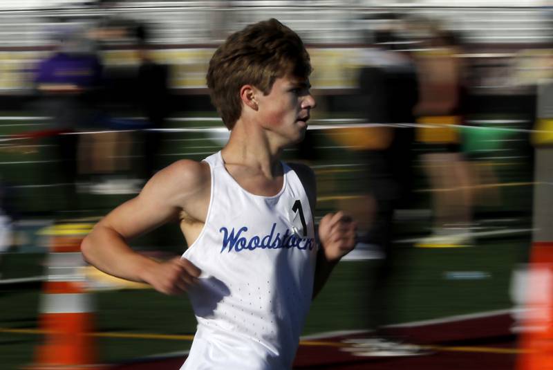 Woodstock's Ellery Shutt cruises to victory as he runs the 3200 meter run during the IHSA Class 2A Richmond-Burton Sectional Boys Track and Field Meet on Wednesday, May 20, 2026, at Richmond-Burton High School.
