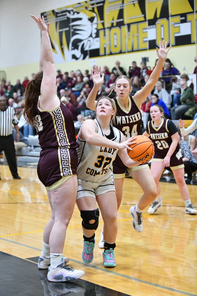 Reed-Custer's Harlie Liebermann looks to shoot under pressure from Watseka's Megan Martin, left, and Lauren Tegtmeyer during Watseka's 50-24 victory over Reed-Custer in the IHSA Class 2A Herscher Sectional semifinal on Tuesday, Feb. 25.