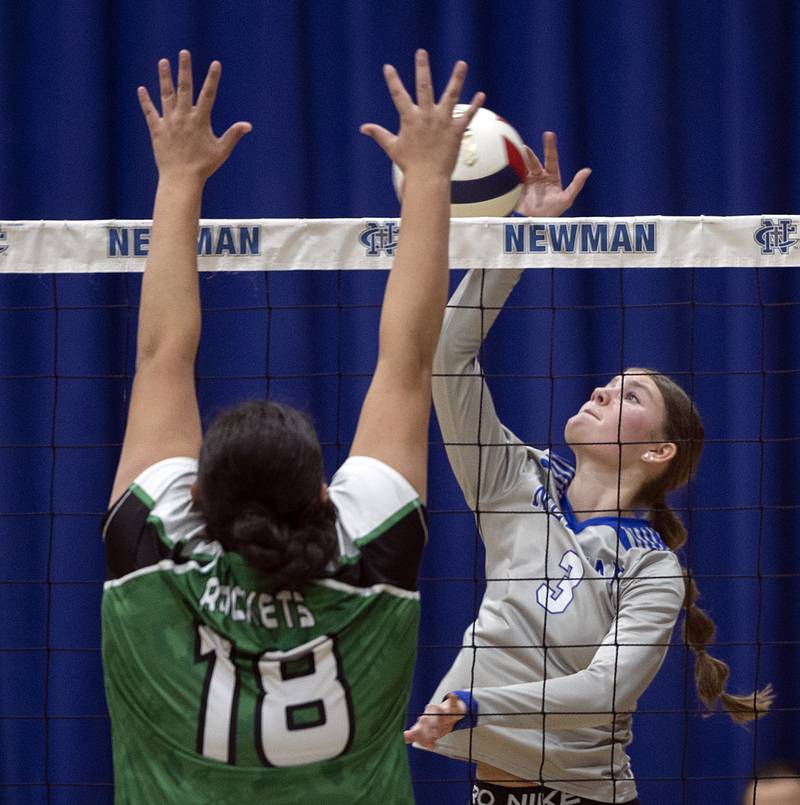 Newman’s Lauren McClain hammers a shot against Rock Falls’ Ari Reyna Monday, Oct. 28, 2024, during regional play at Newman.