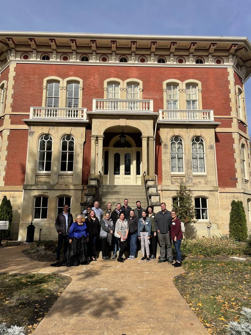 Participants in the IVAC community leadership program tour the Reddick Mansion as a part of community history day.