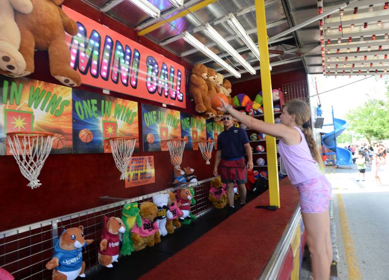 Ruth Rahn of Lisle plays one of the games at the Taste of Westmont Saturday July 12, 2025.