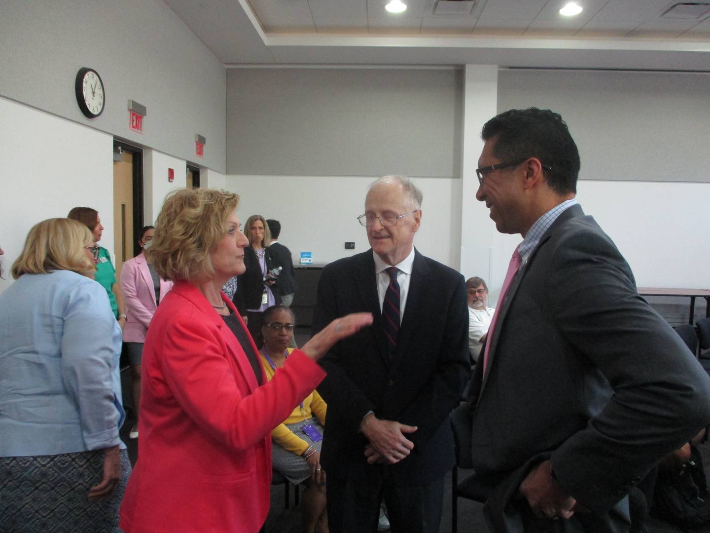 Illinois Supreme Court Judge Mary Kay O'Brien talks with Joliet Junior College President Clyne Namuo (right) and William O'Connor, chair of the JJC Business Education Department, before her speech at the college on Thursday, May 4, 2023.