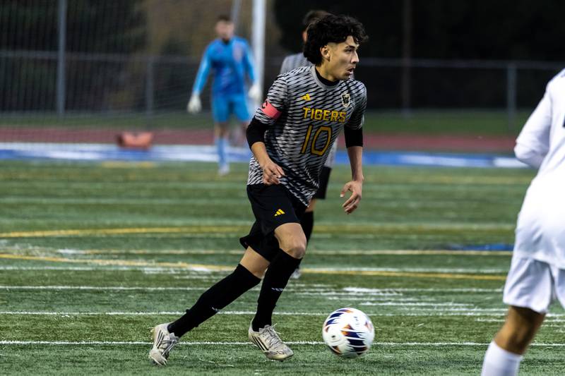 Joliet West's Alexander Mendoza looks for an open teammate during the 3A L-W East Regional boys varsity soccer match against Andrew at Lincoln-Way East on Oct. 21, 2025.