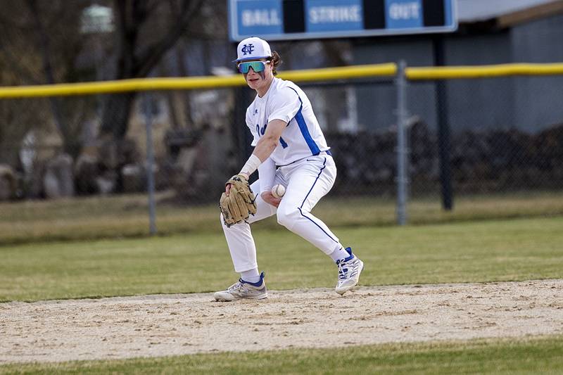 Newman’s Garret Matznick makes a play on a liner for an out against Sterling Tuesday, March 12, 2024.