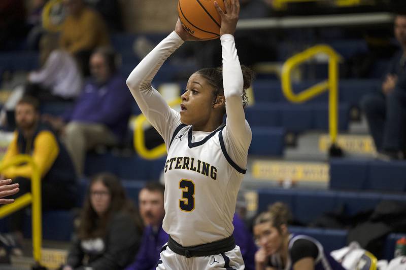 Sterling’s Delali Amankwa looks to pass against Rochelle Monday, Feb. 17, 2025, during the girls 3A regional semifinal game in Sterling.