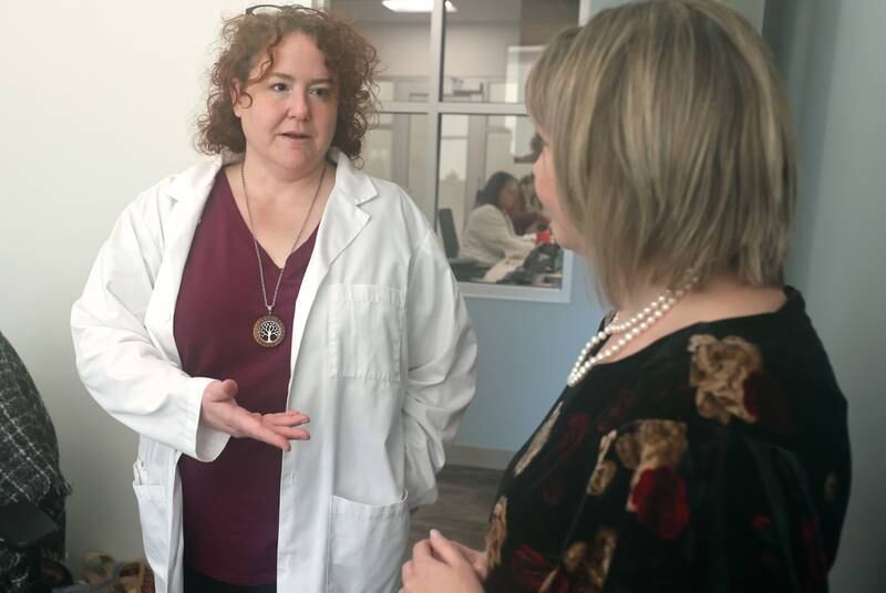 Cheryl Betel, (left) a nurse practitioner at the new Northwestern Medicine Behavioral Health Services Sycamore Clinic, and Marissa Kirch, licensed clinical social worker and manager of the partial hospitalization and intensive outpatient treatment programs at the clinic, talk Wednesday, Nov. 30, 2022, at the facility in Sycamore.