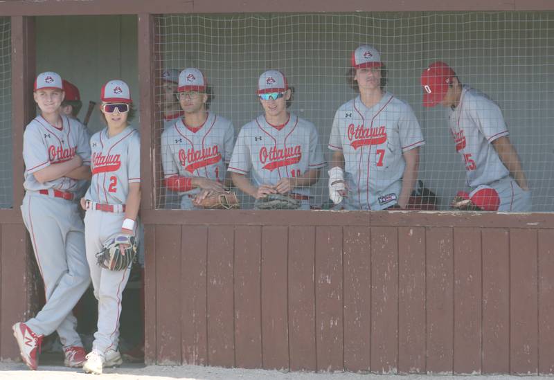 Members of the Ottawa baseball team watch in the dugout while facing Morris during the Class 3A Regional semifinal game on Thursday, May 25, 2023 at Morris High School.