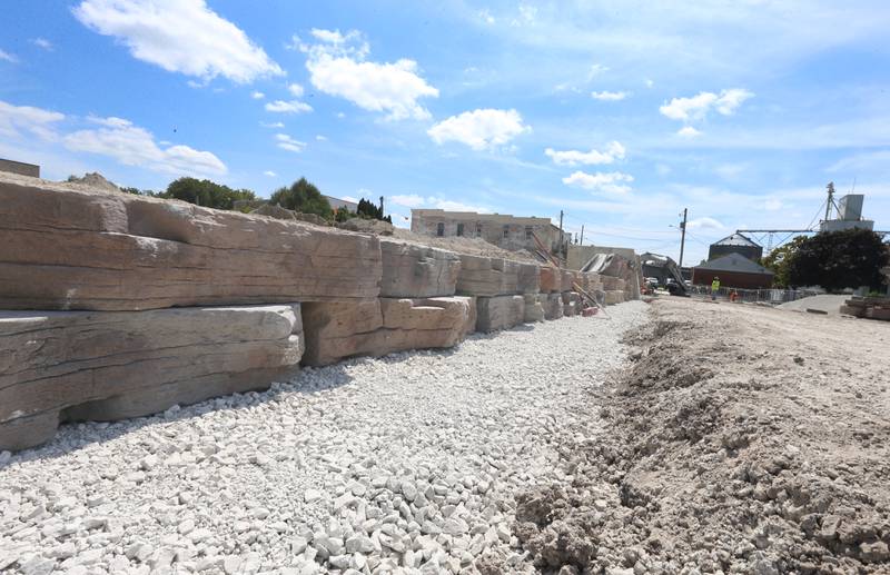 A view of the new partially built wall at the "Market on Mill" retail plaza on Tuesday, Aug. 13, 2024 downtown Utica.