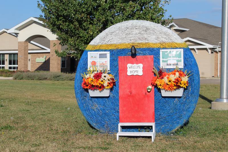 Home Sweet Home: Liberty Village's Manor Court nursing home made a house's front out of their bale. The bale was part of the 2025 Hay Bale Trail in Rochelle throughout October.codyu