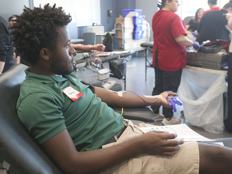 Student Yannis Yong has his blood drawn during the Saint Bede Community Blood Drive on Tuesday, Nov. 4 in the Perino Science Center at St. Bede Academy. The goal was to collect 100 pints this school year. If the school reaches it's goal, the Red Cross will award a $1,000 scholarship to one graduating senior.