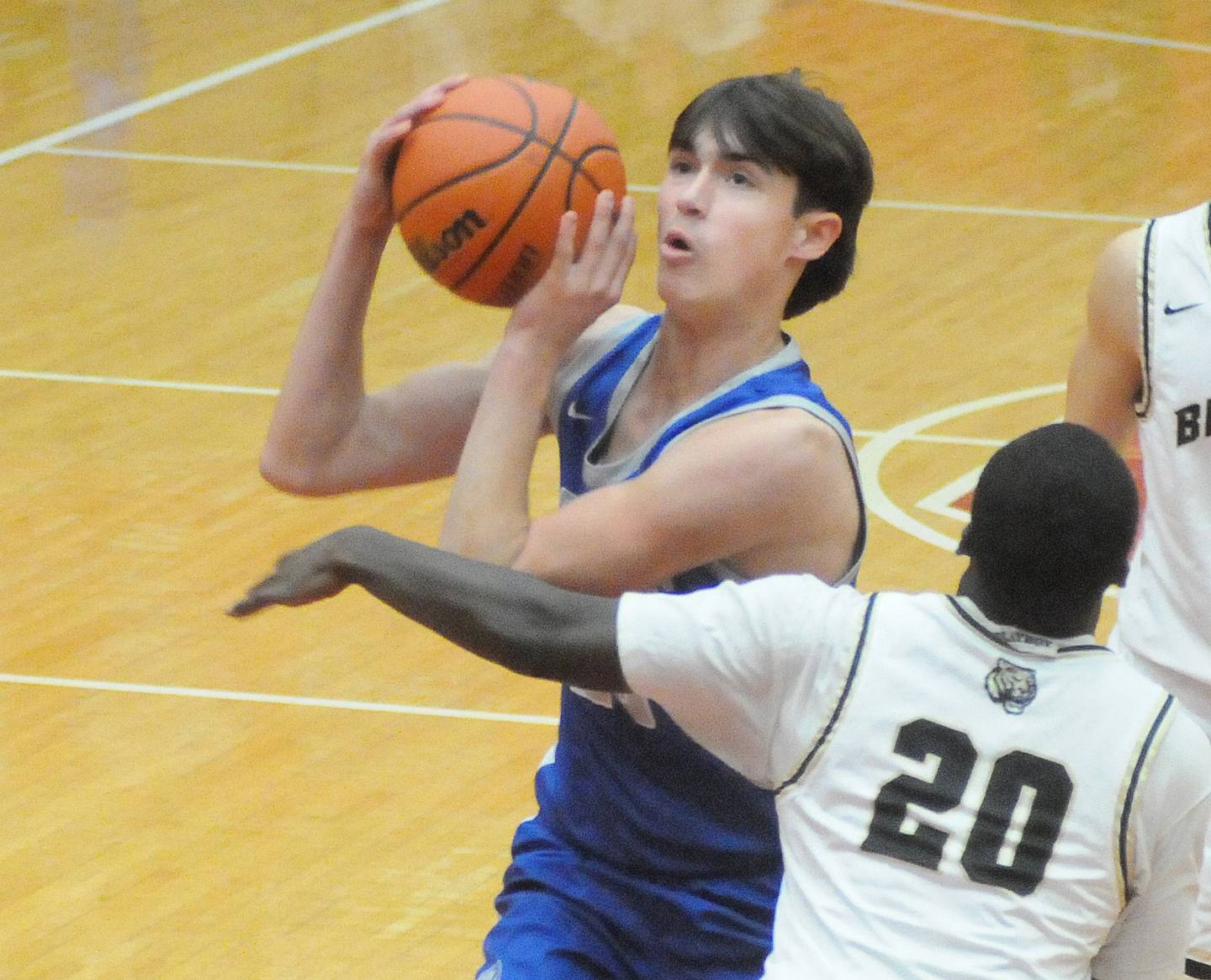 Princeton’s Noah LaPorte gets by Oak Forest’s Johnny Wiggins to score two in the first quarter of Friday's final pool play game of the Dean Riley Shootin' The Rock Tournament at Kingman Gymnasium - 11/25/22