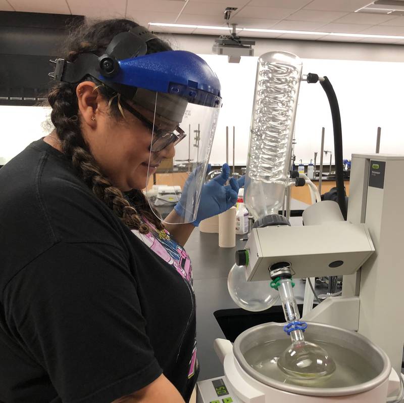 Kishwaukee College student Daniella Zamora working in a chemistry laboratory  during the Robert L. “Smitty” Smith Assistantship