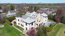 Fit for a suburban king: Oak Brook ‘castle’ house is on the market