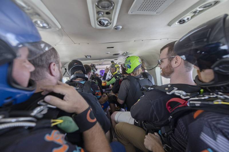 Jumpers ready themselves for the dive Friday, June 27, 2025, as the plane gets to 14,000 feet.