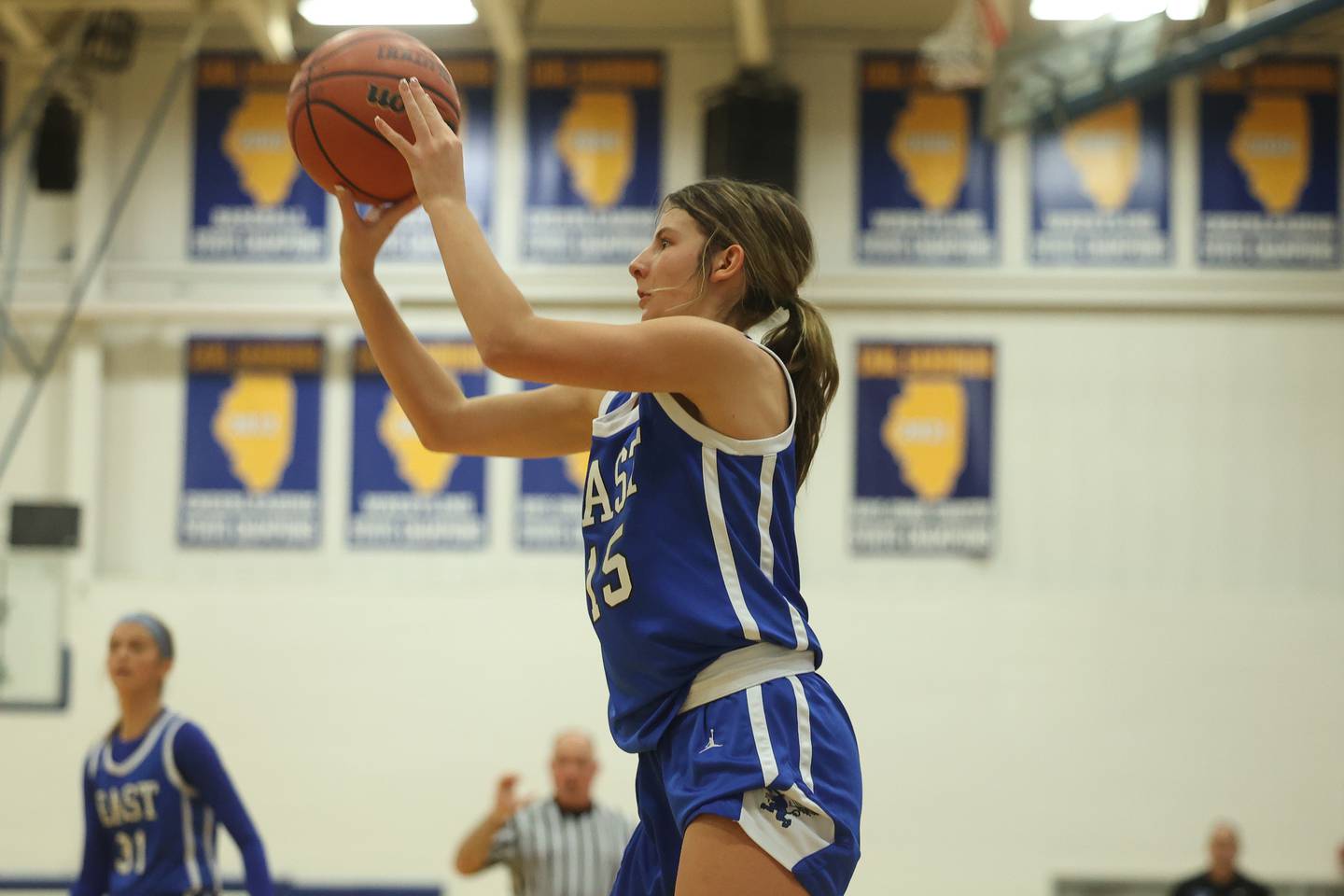 Lincoln-Way East’s Lilly Dockemeyer puts up the three-point shot against Romeoville in the Sandburg Holiday Classic semifinal on Thursday, Dec. 28th, 2023 in Orland Park.