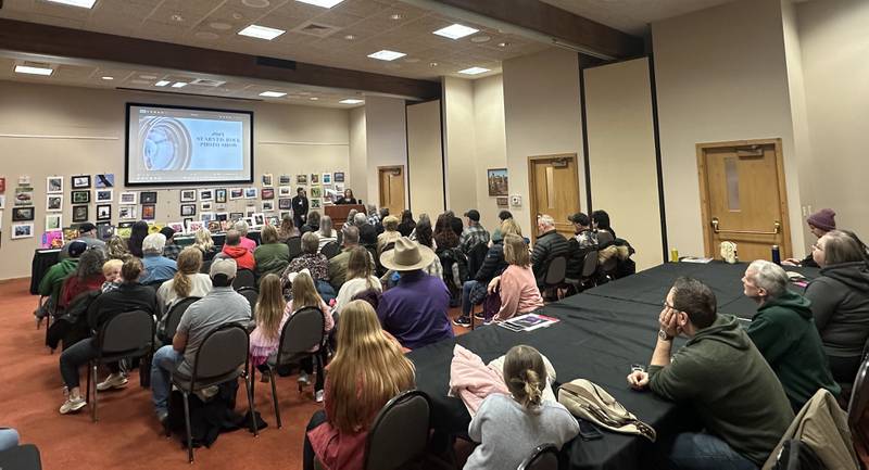 Participants gather during the Starved Rock Photography Show awards on Saturday, Jan. 3, 2026 at the Starved Rock Visitors Center. The show brought in 86 entries were submitted for this years show.