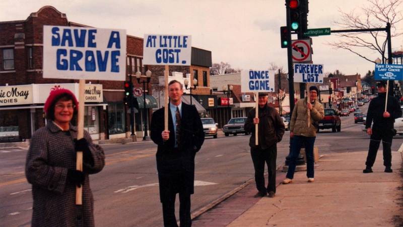 Residents show their support for a referendum 30 years ago to purchase land to save Lyman Woods in Downers Grove.