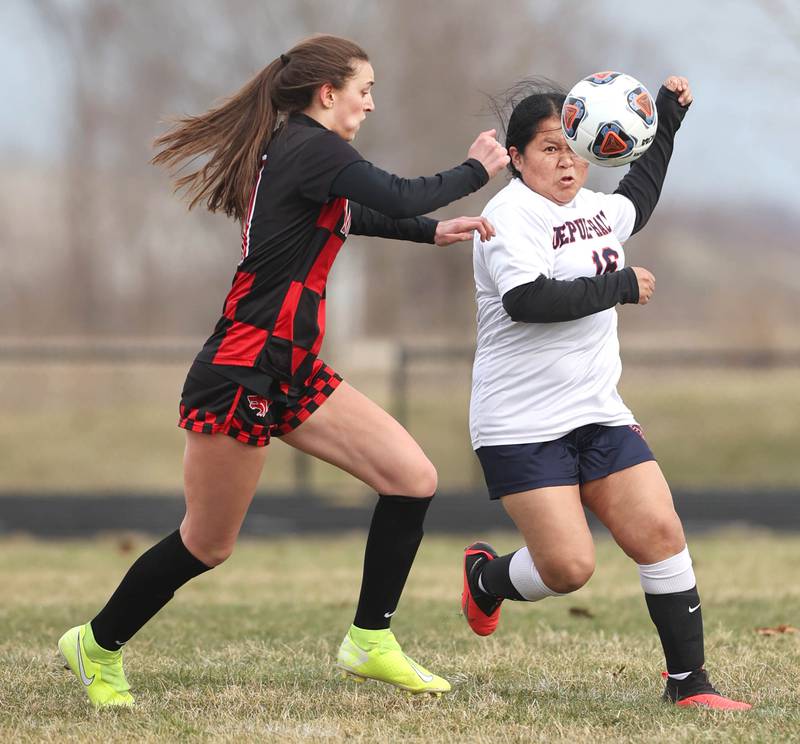 DePue's Miriam Sis and Indian Creek's Isabella Turner chase after a loose ball during their game Tuesday, April 5, 2022, at Indian Creek Middle School in Waterman.