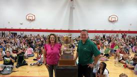 Bradley West administrator Jeff Voss celebrated at school after winning County Amateur Men’s Golf title