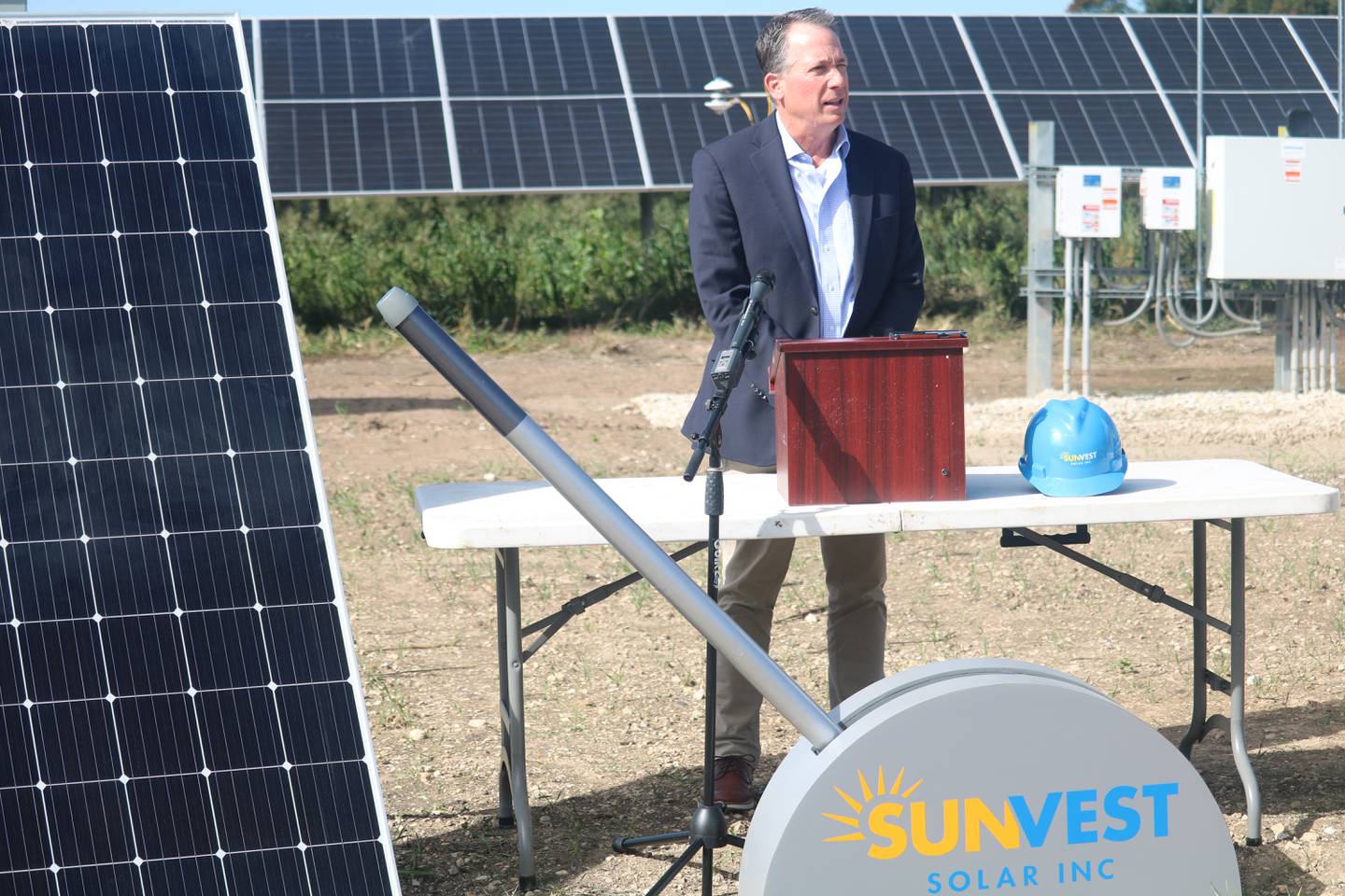 Scott Vogt, vice president of strategy and energy policy at ComEd, speaks Oct. 10, 2023 at a ribbon cutting ceremony in DeKalb to celebrate activation of a community solar installation project.