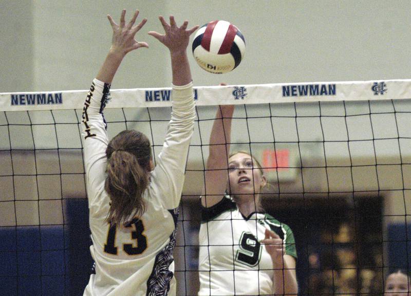 Rock Falls' Kayla Hackbarth hits a ball past Sherrard's Ryan Butz. Rock Falls took on Sherrard in the Class 2A regional volleyball semifinal Tuesday, Oct. 29, 2024 at Newman High School.