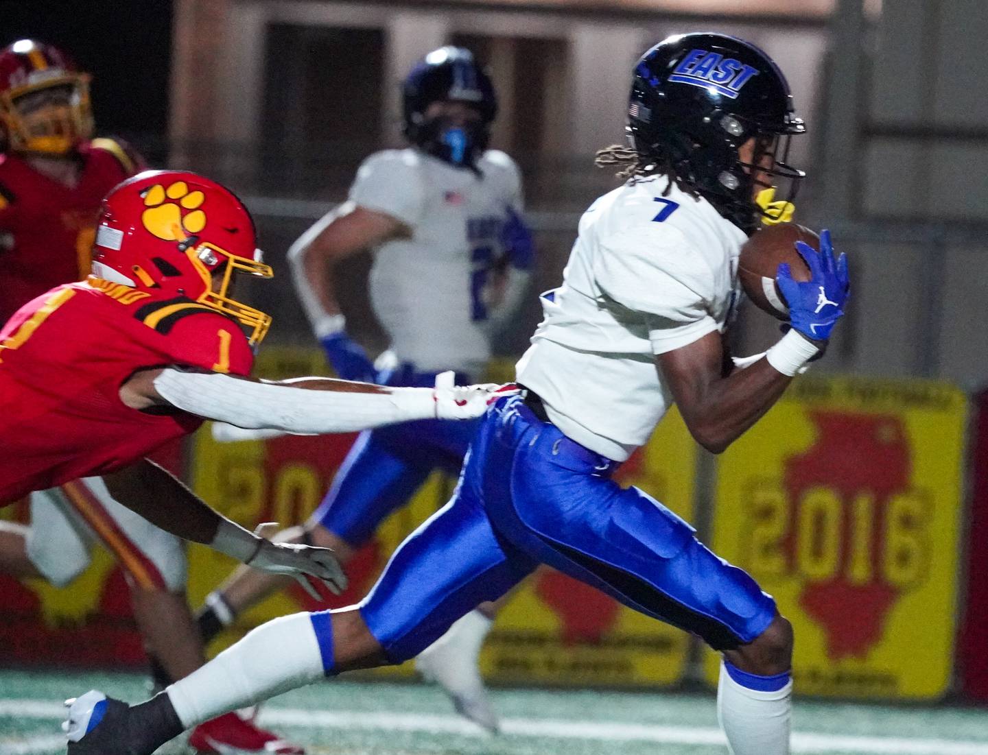 Lincoln-Way East's DJ Richardson (7) runs after the catch for a touchdown against Batavia during a football game at Batavia High School on Friday, Sep 1, 2023.