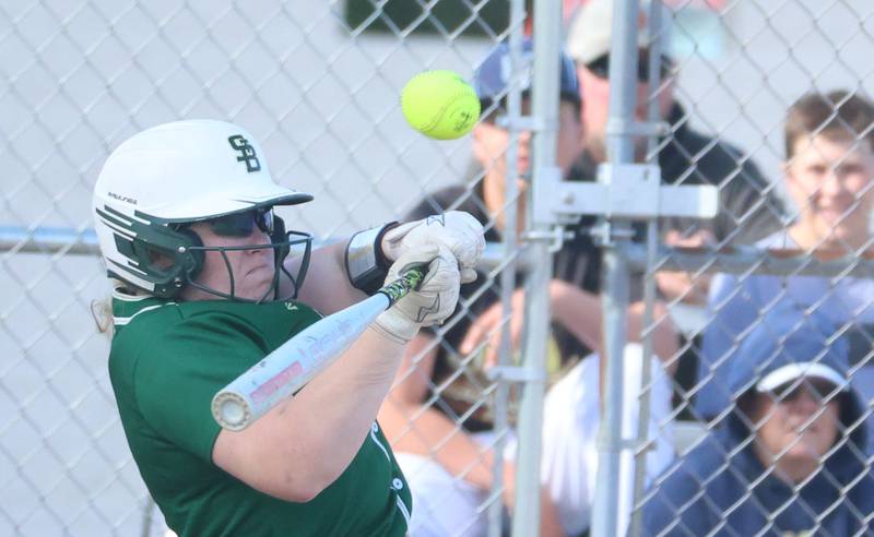 St. Bede's Macy Strauch makes contact with the ball against Marquette on Tuesday, April 23, 2026 at June Cross Field in Ottawa.