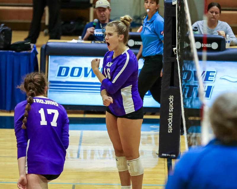 Downers Grove North's Jennifer Buehler (16) celebrates a kill during volleyball match between Downers Grove North at Downers Grove South.  Sept 7, 2023.