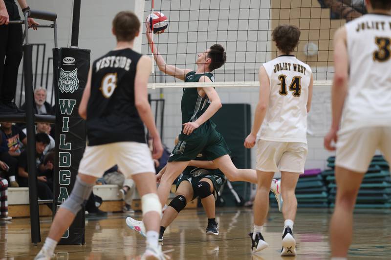 Plainfield Central’s Jaden Frankiewicz runs down the ball against Joliet West on Tuesday, April 23, 2024 in Plainfield.