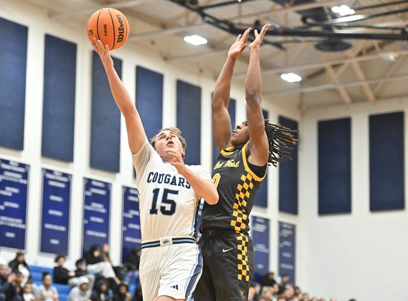 Plainfield South's Brayden Ablin drives to basket for a shot during the conference game against Joliet West on Friday, DEC. 05, 2025, at Plainfield.
