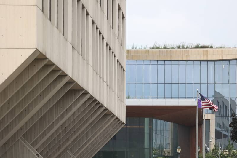 The new Will County Courthouse sits in the background of the old Will County Courthouse on Thursday, Aug. 17, 2023 in Joliet.