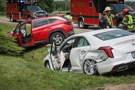 2 injured in crash that landed 2 cars in a ditch in Woodstock 