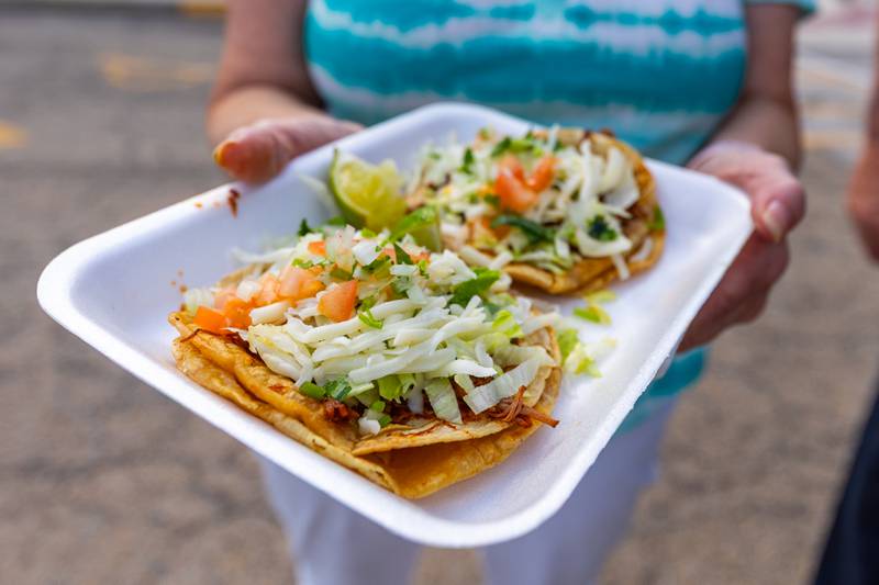 Jeanne Fitzpatrick holds tacos from Salinas food truck on Monday, Aug 25, 2025 on Illinois Avenue in Mendota.